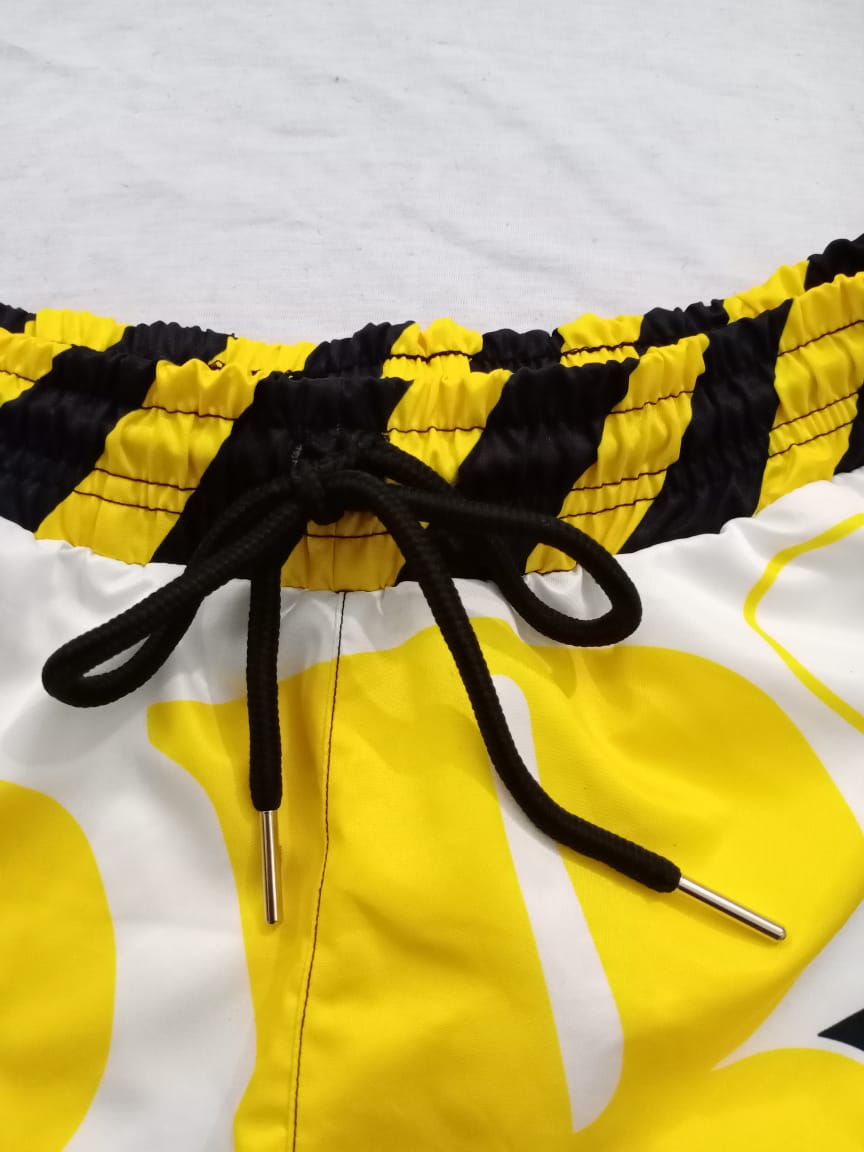 "BRAND" Caution swim shorts